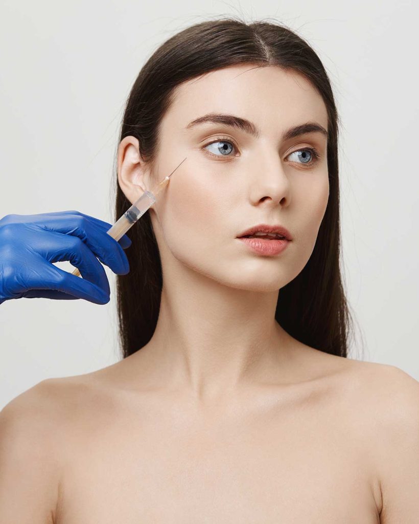 woman-beauty-salon-look-away-receive-bottox-face-injection-with-syringe